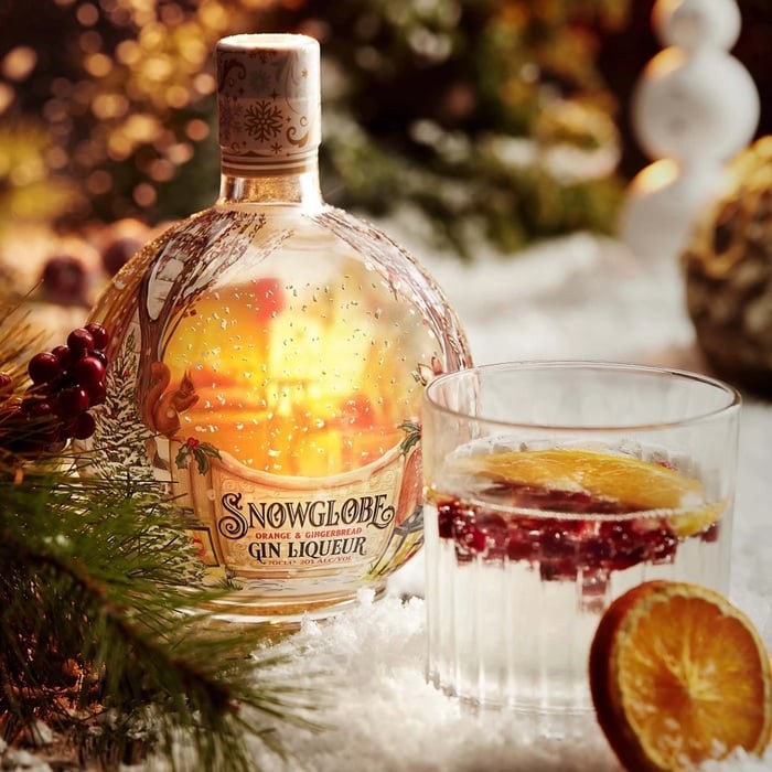 snowglobe_orange_gingerbread_3.webp